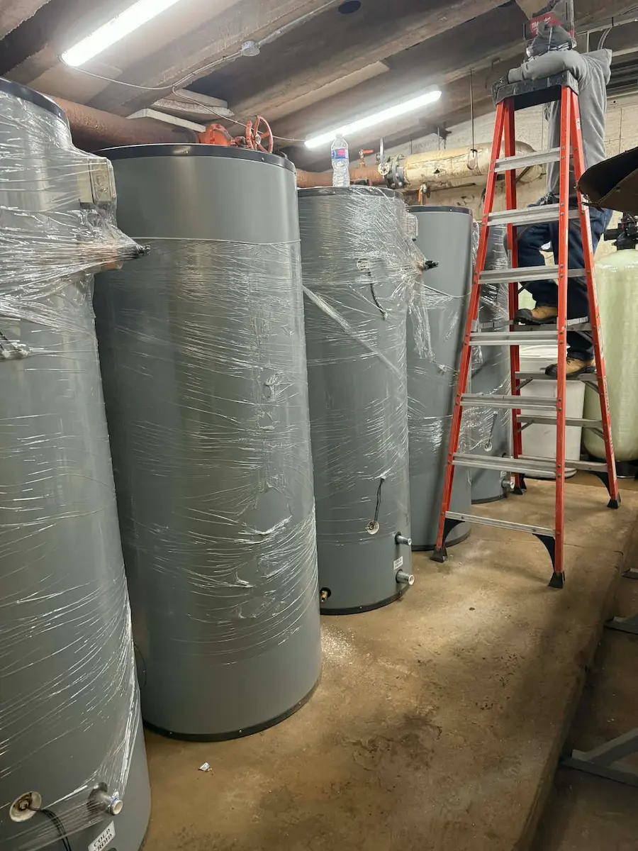 Large insulated tanks with ladder in mechanical room
