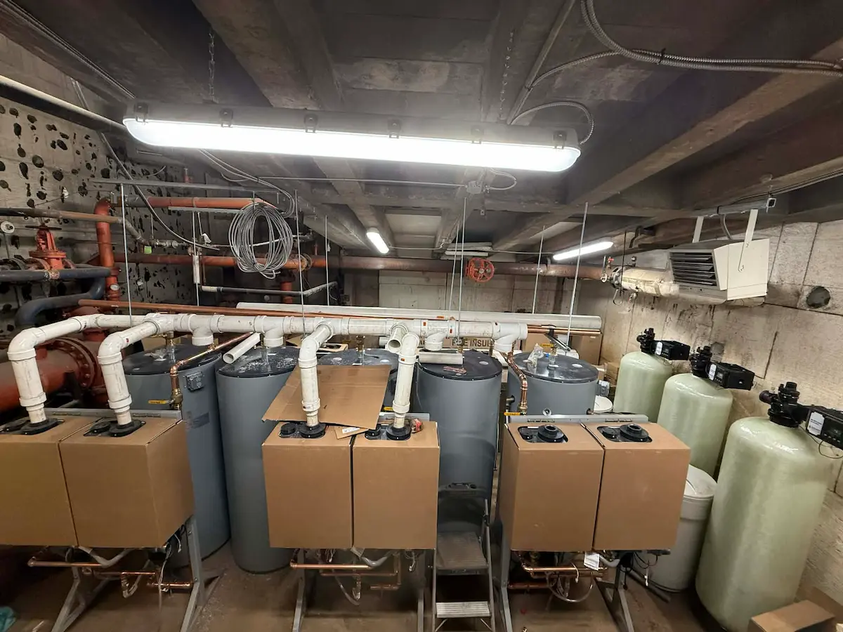 Equipment room with multiple tanks and boxed materials