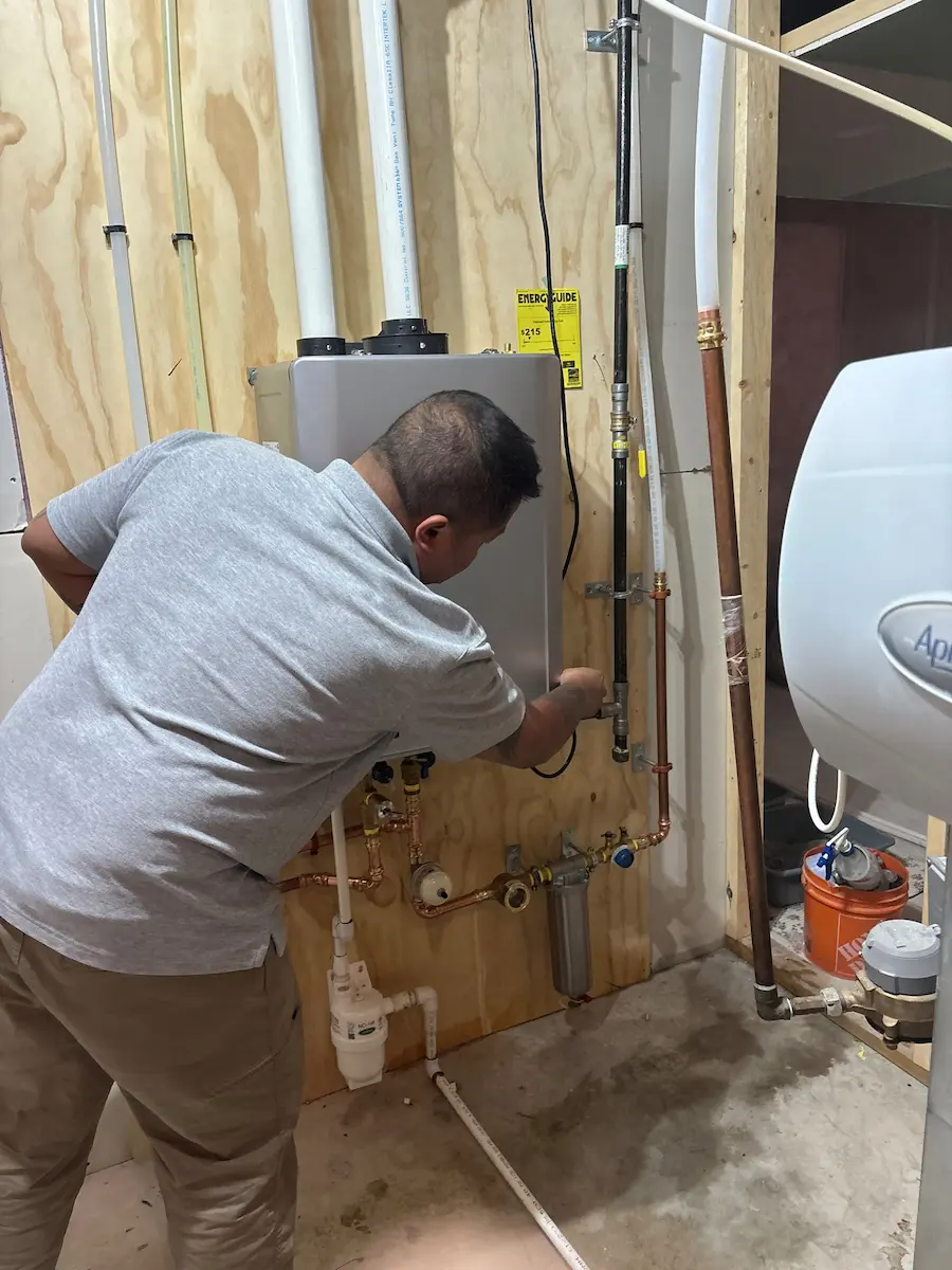 Technician repairing an electrical panel